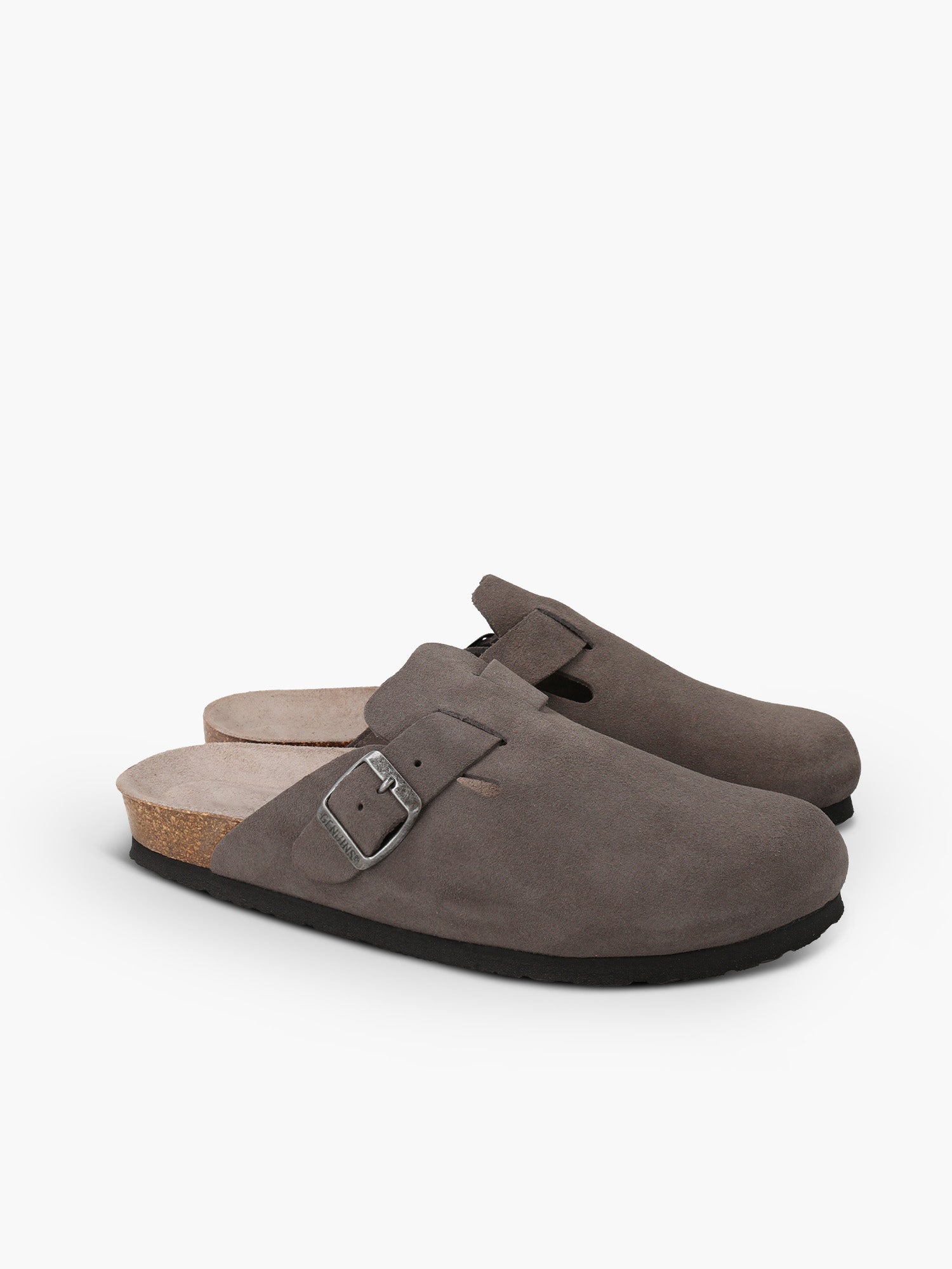 Zueco Genuins Riva  de piel serraje color gris con planta anatómica de caucho corcho y hebilla ajustable metálica para hombre vista lateral doble.